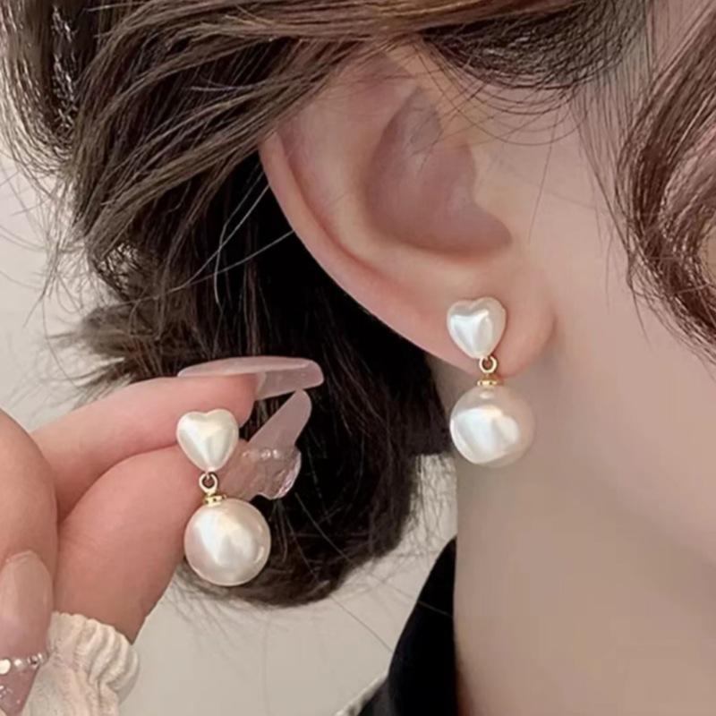 Orecchini alla moda con frange, lussuosi e sofisticati, dal fascino elegante. Lunghi Orecchini di Perle per uno Stile Versatile e Raffinato.
