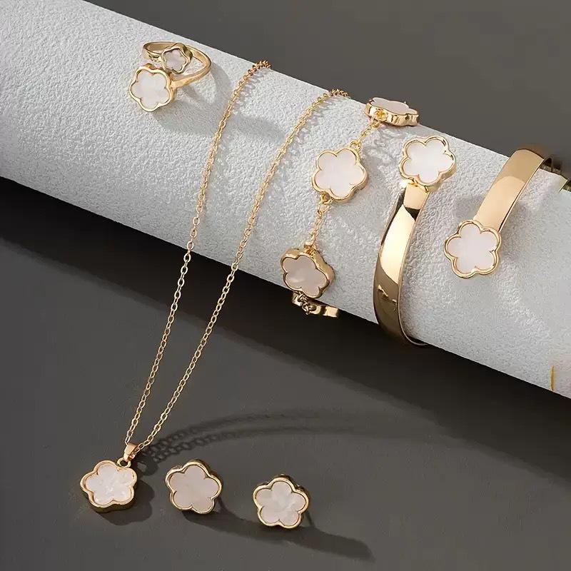 Elegant 5-Piece Flower Jewelry Set: Necklace, Bracelet, Earrings, and Ring.