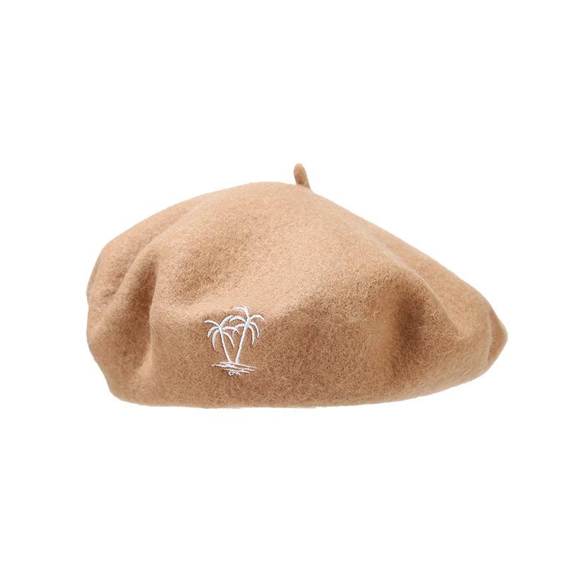 Cappello in lana da donna berretto retrò britannico con ricamo di cocco berretto alla moda viso piccolo moda semplice cappello da pittore all'ingrosso