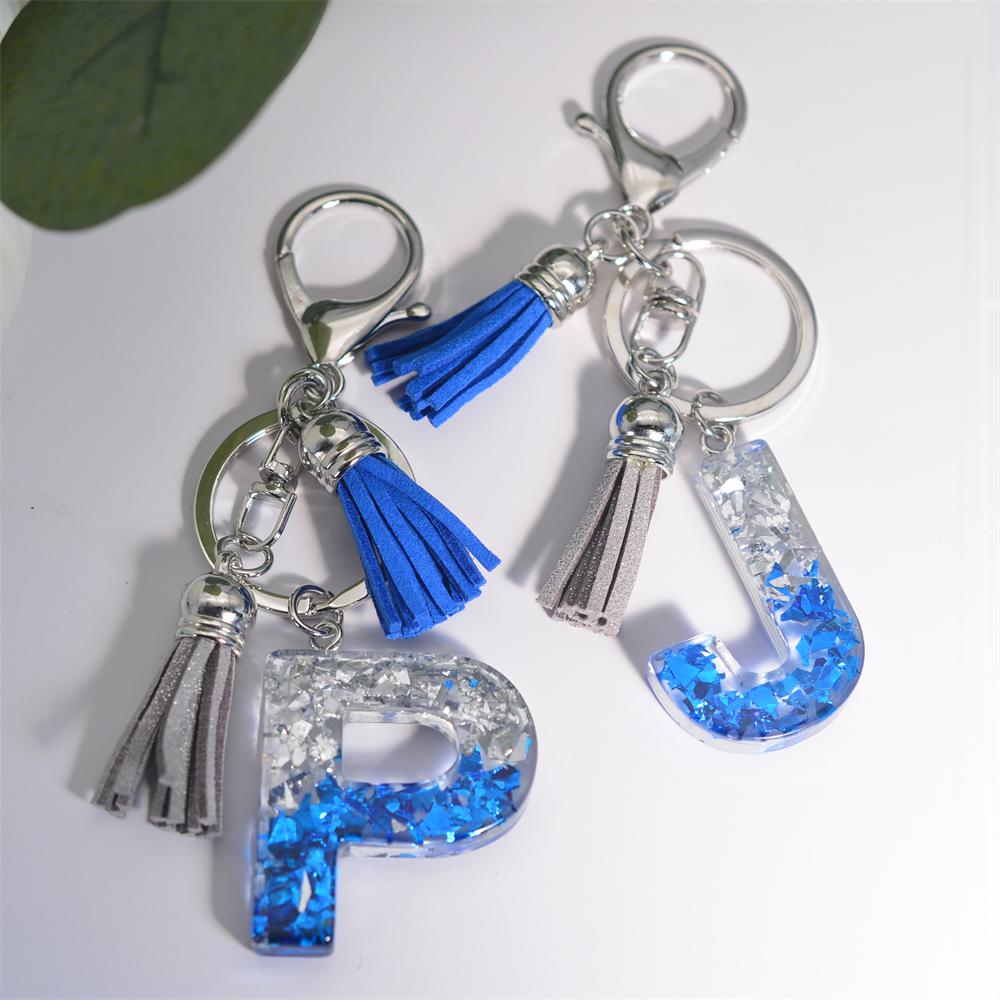 Креативные брелки из смолы с 26 буквами и кисточками — фото 5