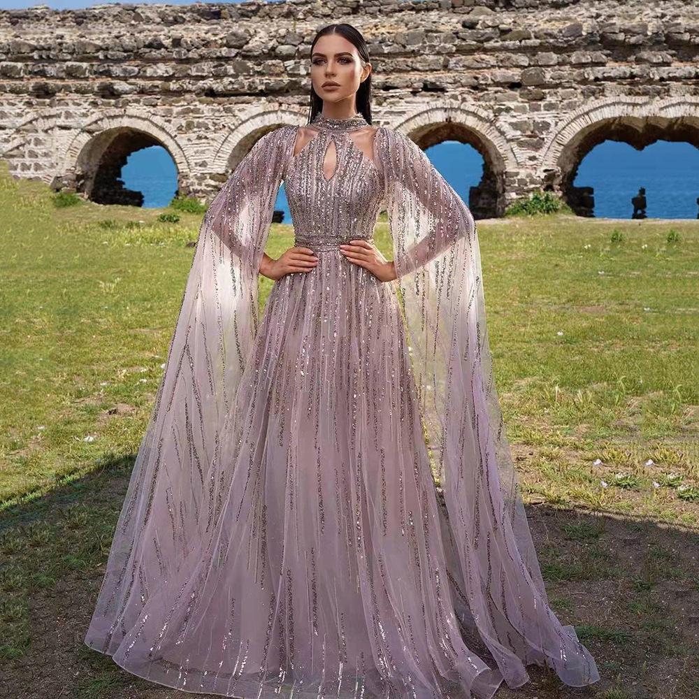 Nuovo abito da sera con frange e paillettes, abito in rete con temperamento, abbigliamento da donna europeo e americano per la primavera e l'estate