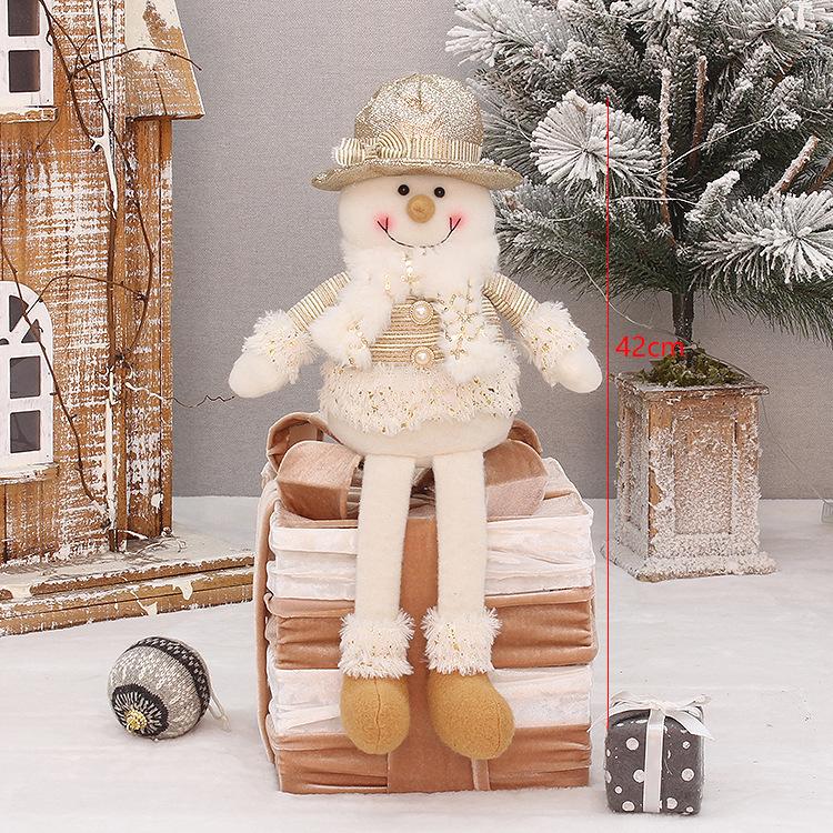 

Off-gold fabric sitting retractable old man snowman doll light-colored Christmas ornament ornament