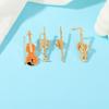 1Pcs Symphony Orchestra Badge Funny Musical Instruments Enamel Brooches Trumpet Clarinet Saxophone Violin Shaped Golden Pins