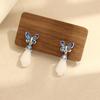 Gericht retro stil tropfendes Öl blaue Schmetterling Ohrringe Magnolienblüten Ohrringe Gold und Silber zweifarbig ohrlose Ohrringe Clips Ohrringe Damen