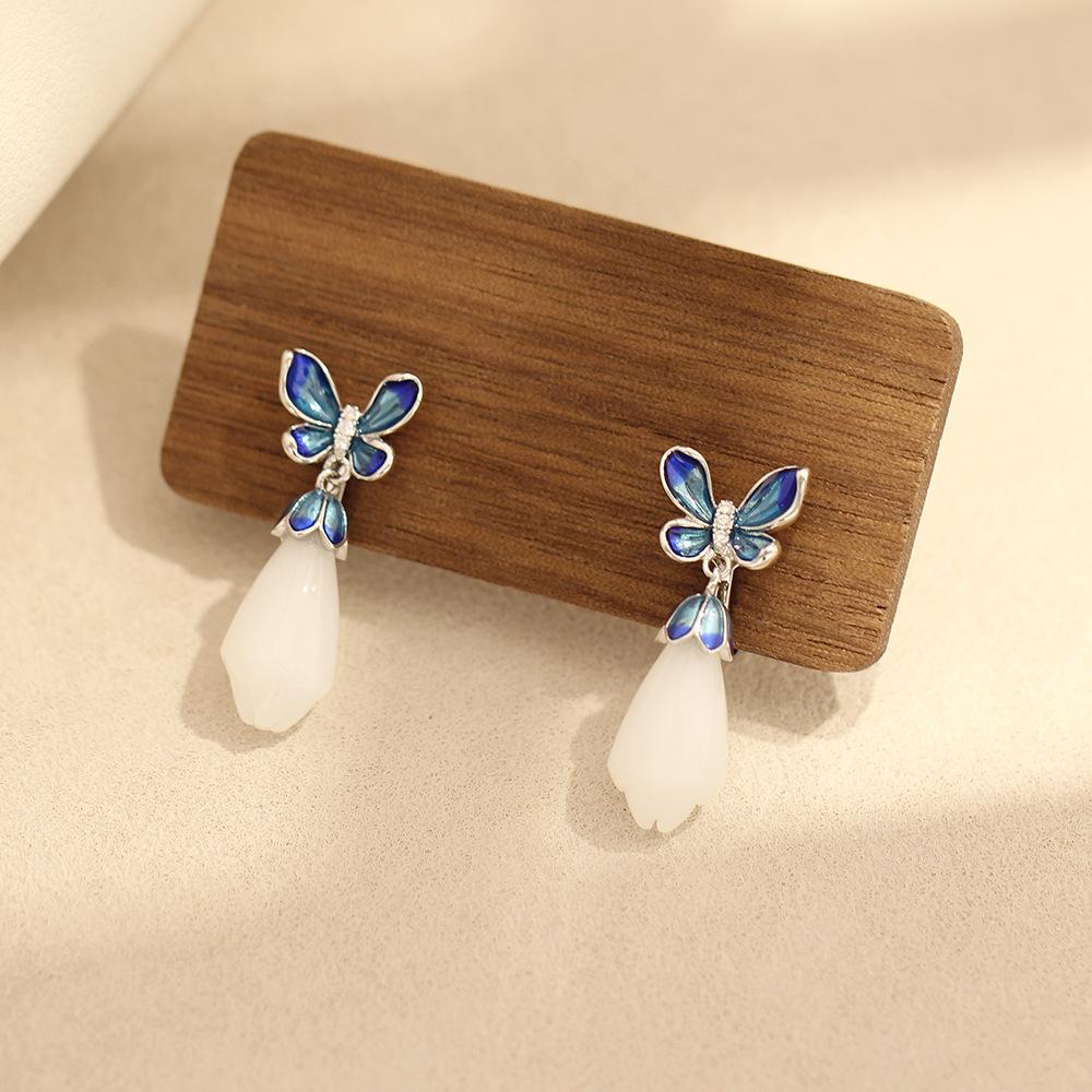 Gericht retro stil tropfendes Öl blaue Schmetterling Ohrringe Magnolienblüten Ohrringe Gold und Silber zweifarbig ohrlose Ohrringe Clips Ohrringe Damen