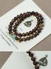 Women's Black Pearwood 8mm Double-Strand Bracelet with Aventurine Lotus Seed Pod Pendant - Retro Buddhist Beads Jewelry for Couples.