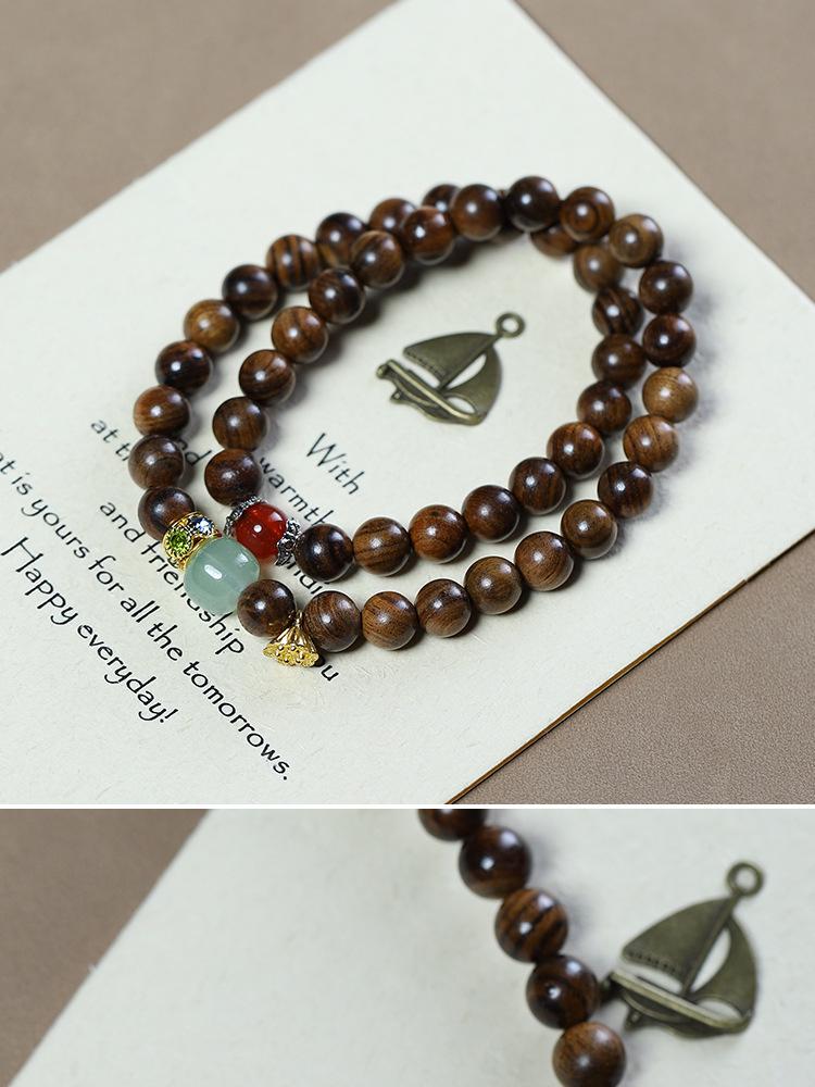 Women's Black Pearwood 8mm Double-Strand Bracelet with Aventurine Lotus Seed Pod Pendant - Retro Buddhist Beads Jewelry for Couples.