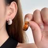 Eleganckie kolczyki z żywicy kawowej dla kobiet – moda jesienno-zimowa