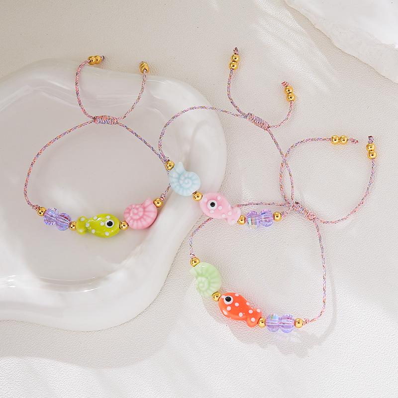 Bohemian Handmade Braided Rope Bracelet with Small Fish and Conch Charms