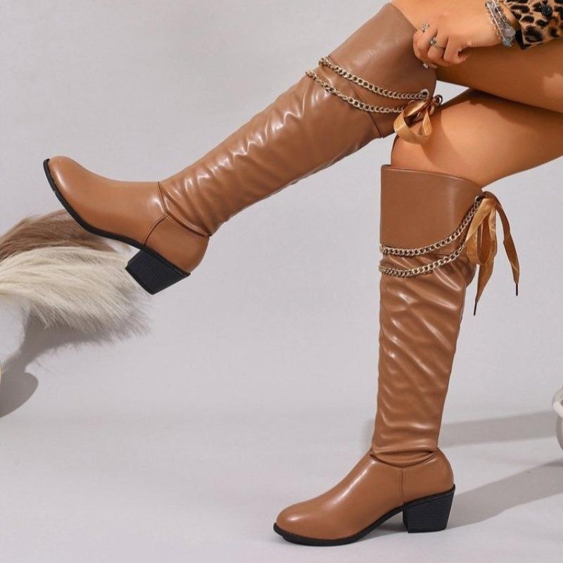 Nowy styl butów jeździeckich damskich na jesień/zimę 2025: retro metalowy łańcuch szpiczasty nosek, gruby obcas, kozaki do kolana