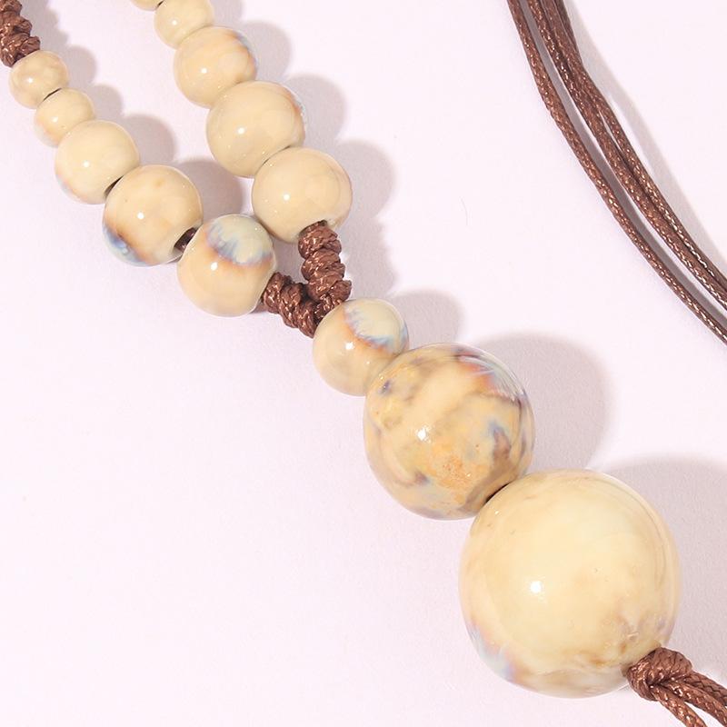 Lång vävd etniskt stil halsband mångsidigt dam handgjort kalebass keramiskt halsband högtidsgåva hänghalsband