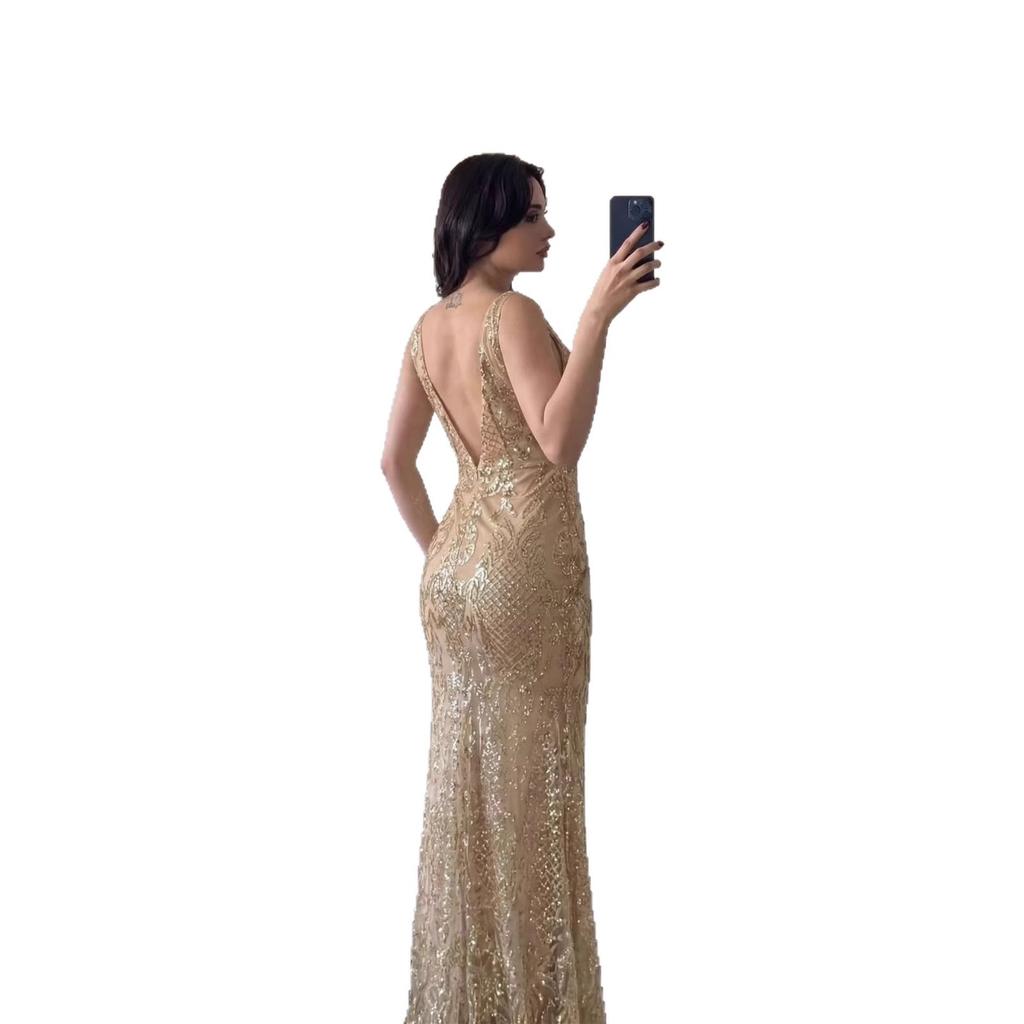 Frühling und Sommer 2026 grenzüberschreitend neue europäische und amerikanische Damenbekleidung Amazon, ärmelloses V-Ausschnitt langes Kleid mit aufgesprenkeltem Gold, durchscheinend