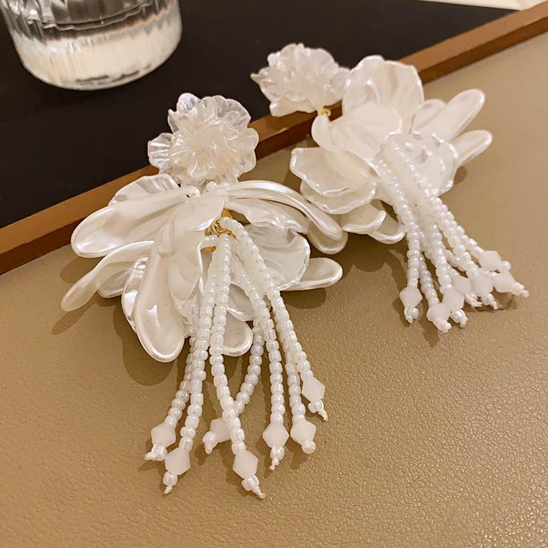Silver needle flower petals crystal fringed earrings French high-end delicate earrings super fairy fashion new earrings women