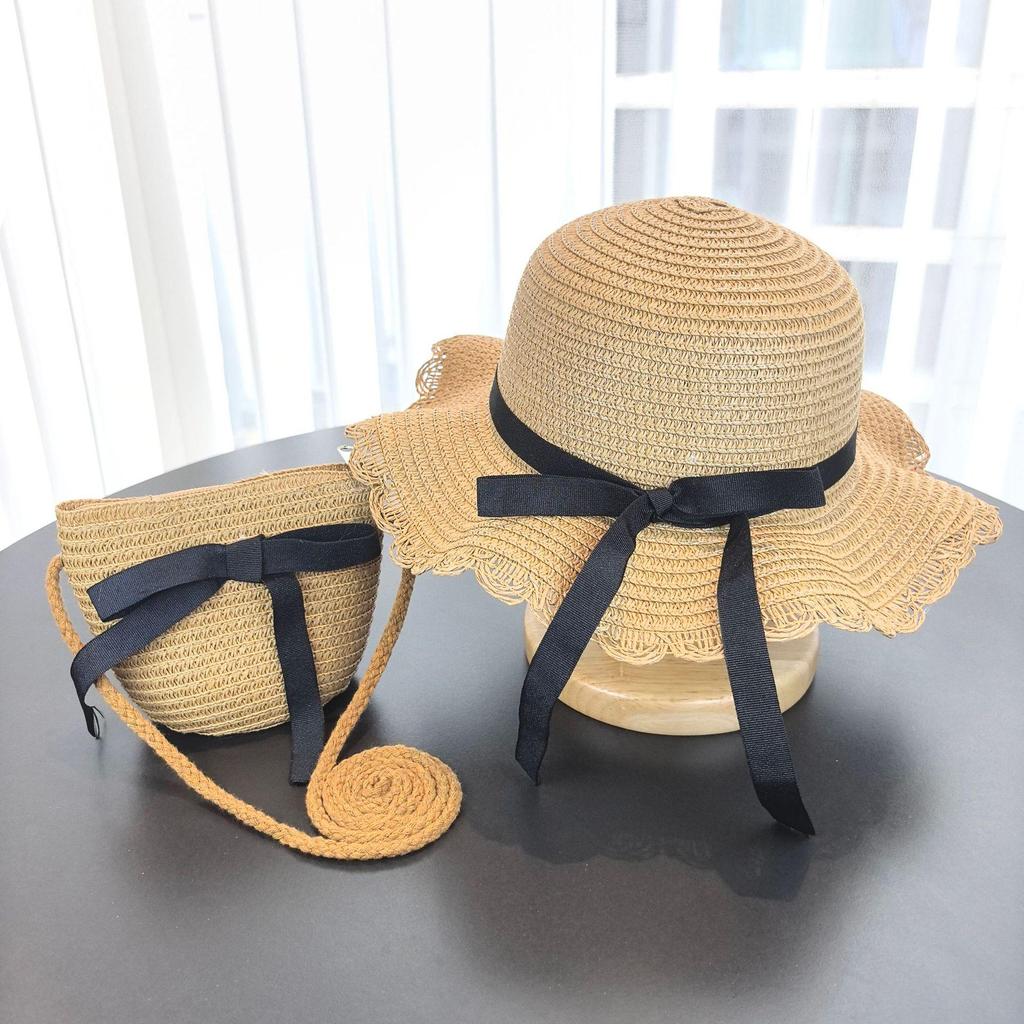 Letni słomkowy kapelusz typu bucket hat z ochroną przeciwsłoneczną dla dziewczynki, na plażę i podróż