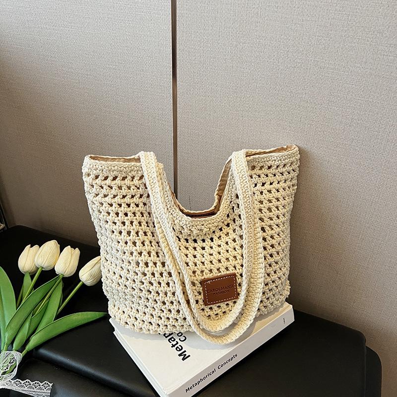 

Commuter large-capacity hollow woven bag women s new versatile shoulder bag casual knitted tote bag