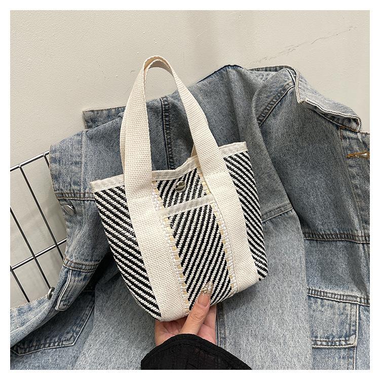 

2025 new commuter bag tote bag woven handbag simple striped woven bag ins versatile tote bag women