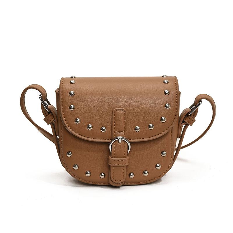 

Personalized rivet small bag 2025 new Korean version of fashion niche shoulder bag ins women s crossbody saddle bag tide коричневий