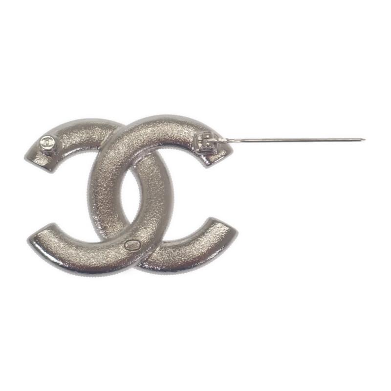 CHANEL  Brooch Silver metal/crystal Women