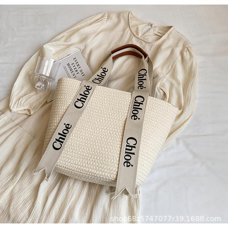 Gewebte Tasche im ausländischen Stil, Damen, Frühjahr/Sommer 2025, neue französische Schultertasche, Freizeit-Urlaubstasche, Strandtasche, Gemüsekorb