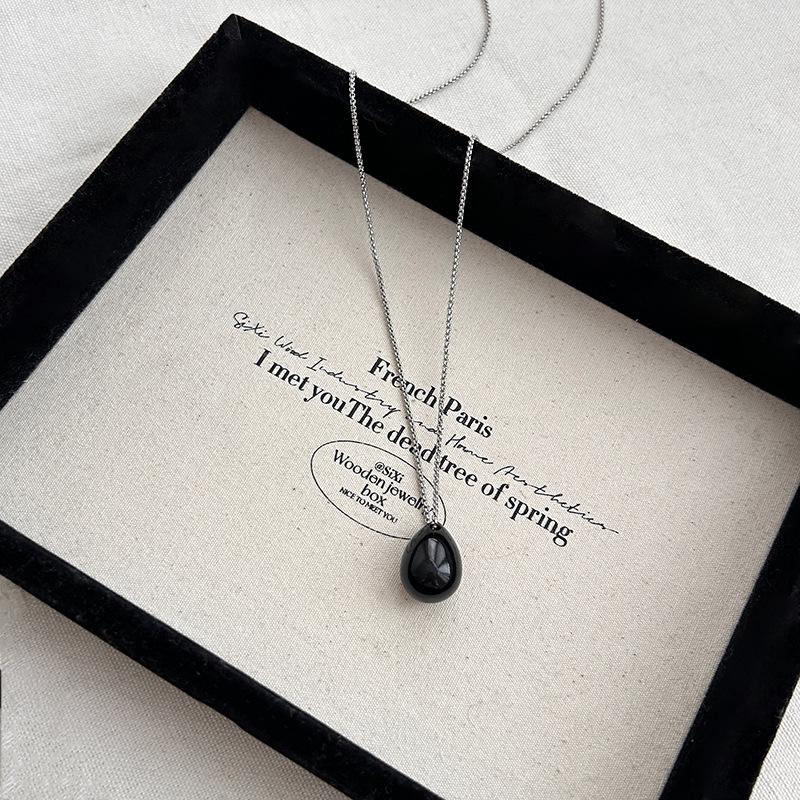 

Мінімалістичне титанове сталеве кольє-підвіска Крапля води для жінок чорний