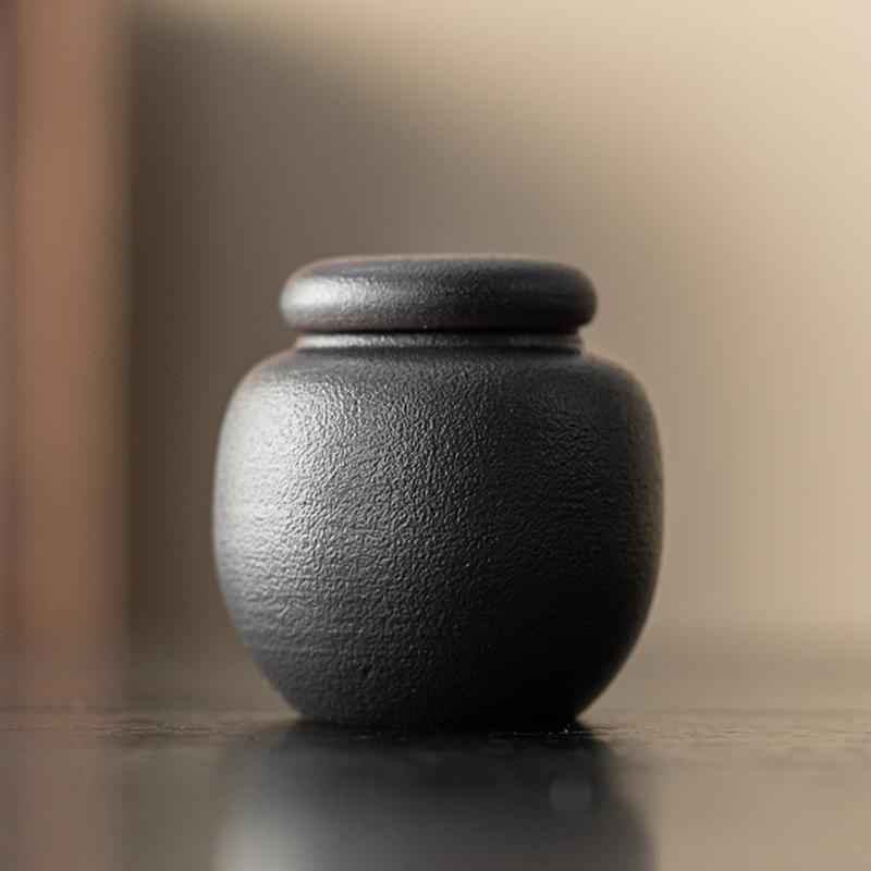 

Керамические чайницы Контейнер для сахара улуна Дорожная герметичная банка для чайных пакетиков Контейнер для кофейного порошка Черный Белый Бытовой бак для хранения 7x7cm 150ml чёрный