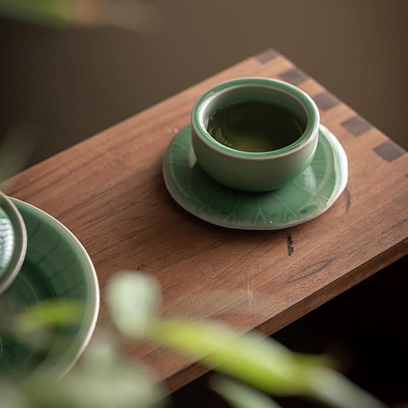 Celadon shadow carving coaster, Chinese antique kung fu tea set, handmade tea holder, ceramic lotus leaf coaster