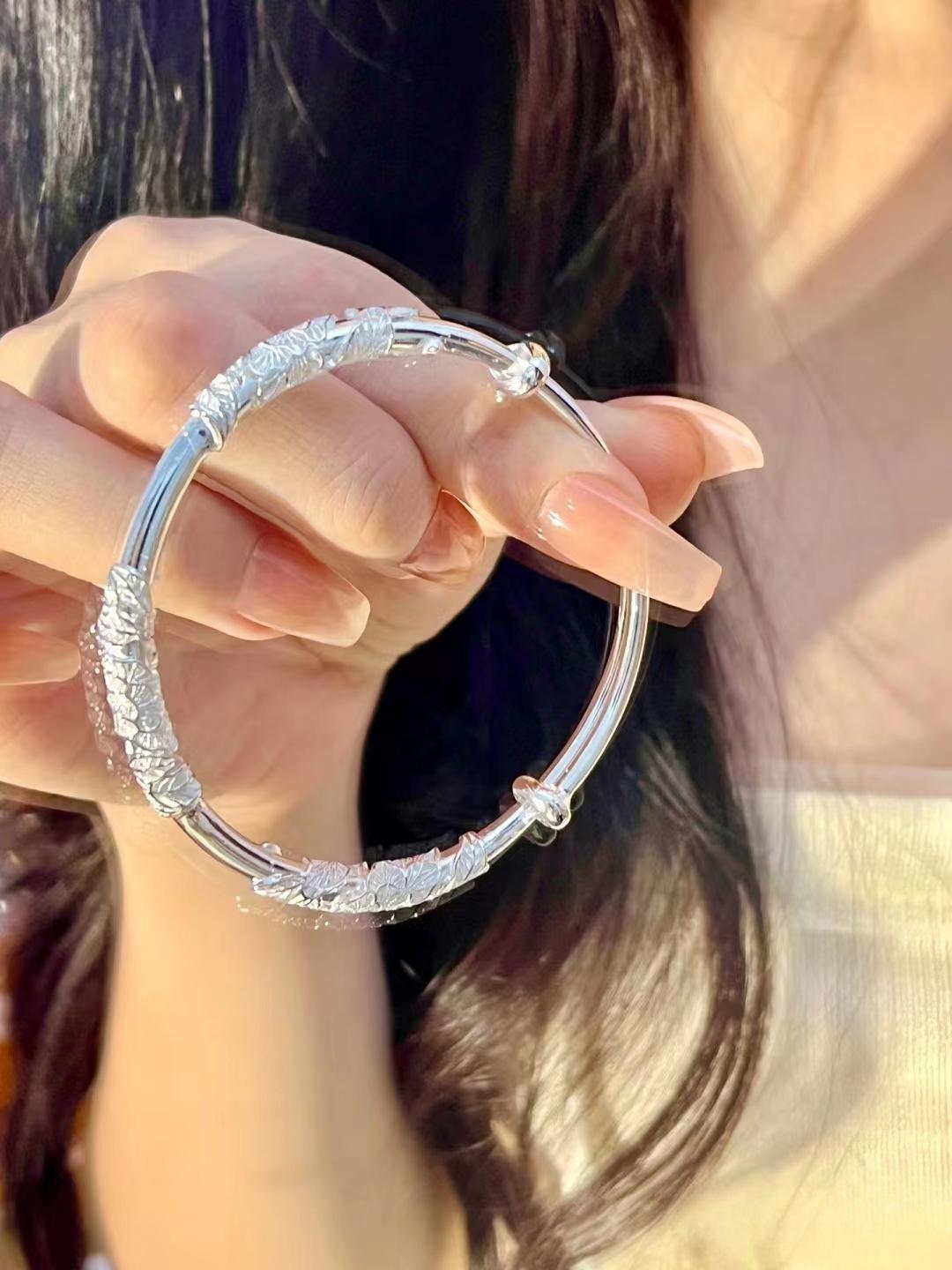 

Цветущий филигранный браслет из акации: Дизайн Push-Pull в китайском стиле 2023 года