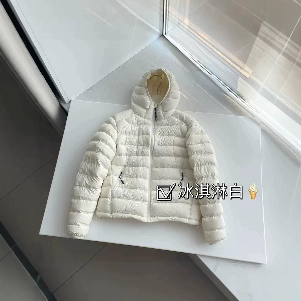 New autumn and winter high-end white duck down light and short hooded ribs down jacket women's jacket tide