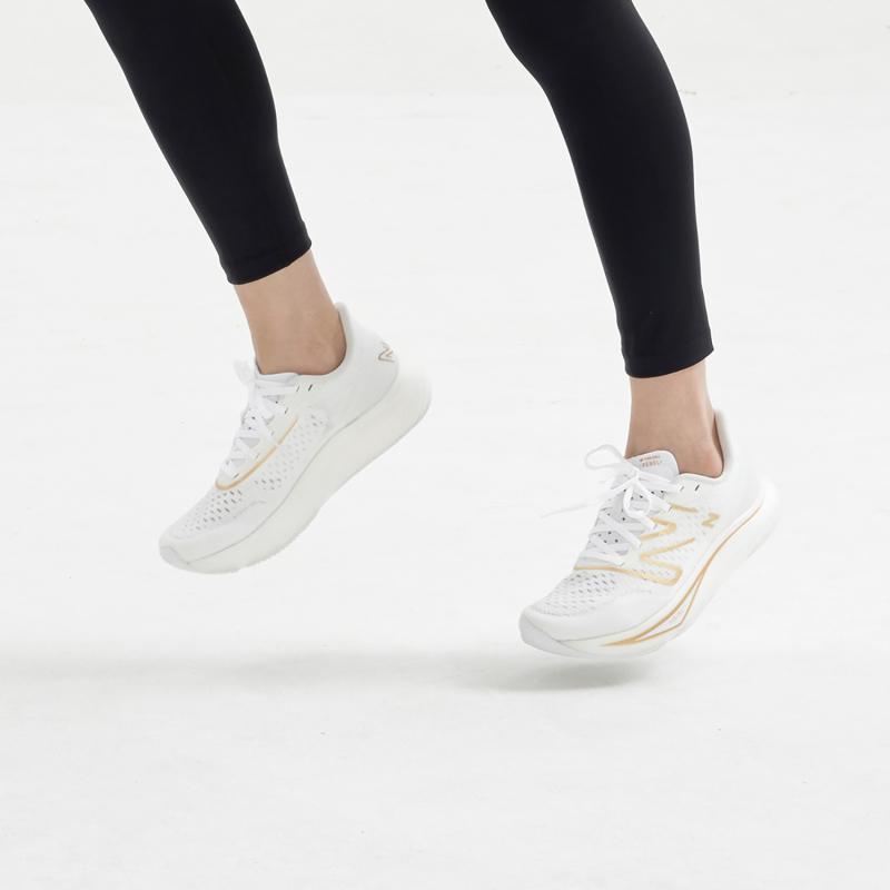 New Balance Women's FuelCell Rebel V3 'White Gold Metallic' Women's Sneakers WFCXMW3
