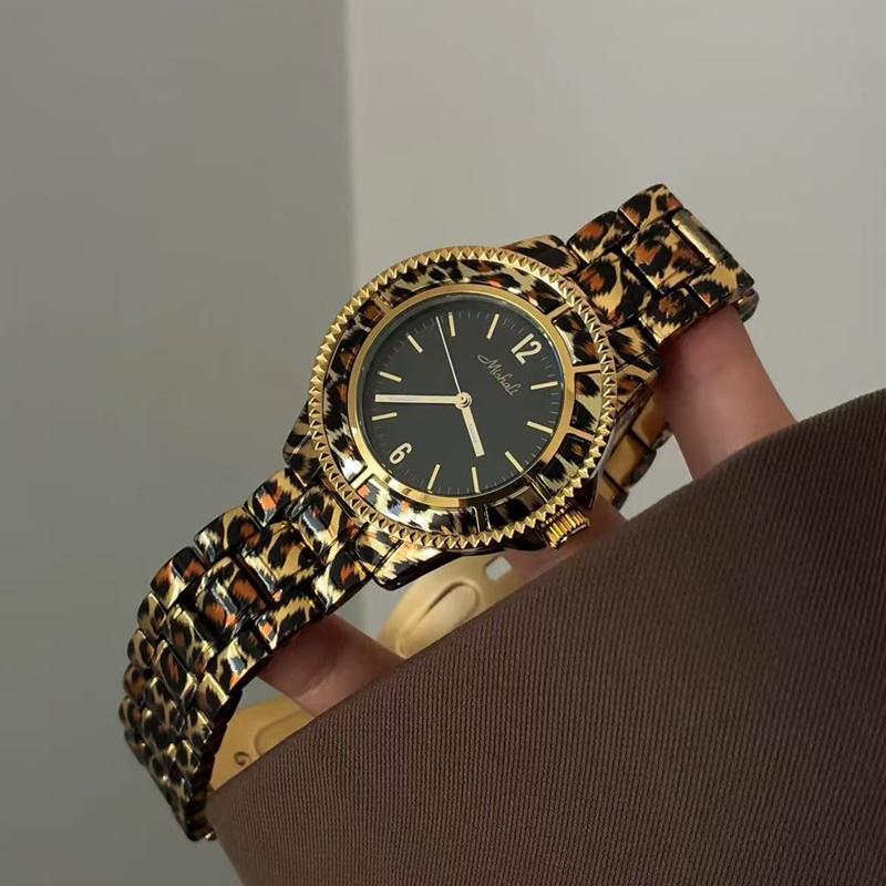 Leopardenmuster-Uhr für Damen, Vintage-Quarzuhr, High-End und luxuriöse Armbanduhr, Kleine goldene Uhr, Trendige Damenuhr.