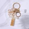 Chic White Tassel Letter Keychain with Resin Epoxy Pendant - Stylish Ornament for Bags