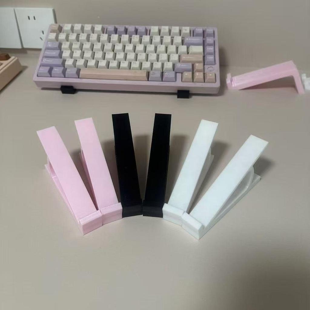 Keyboard Riser Stand: Elevate and angle your keyboard for more comfortable typing, featuring a non-slip design.