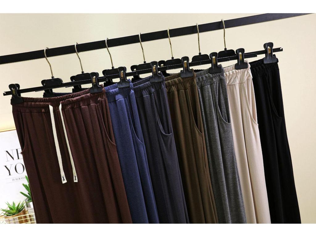 Dámská elastická midi sukně áčkového střihu - Modalová kapsa, ležérní, volný střih na jaro/léto