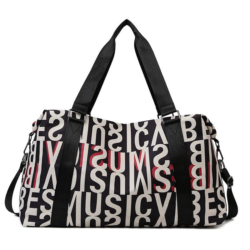 Multifunctional Yoga and Sports Travel Bag with Dry/Wet Separation, Large Capacity, and Trolley-Ready Design.