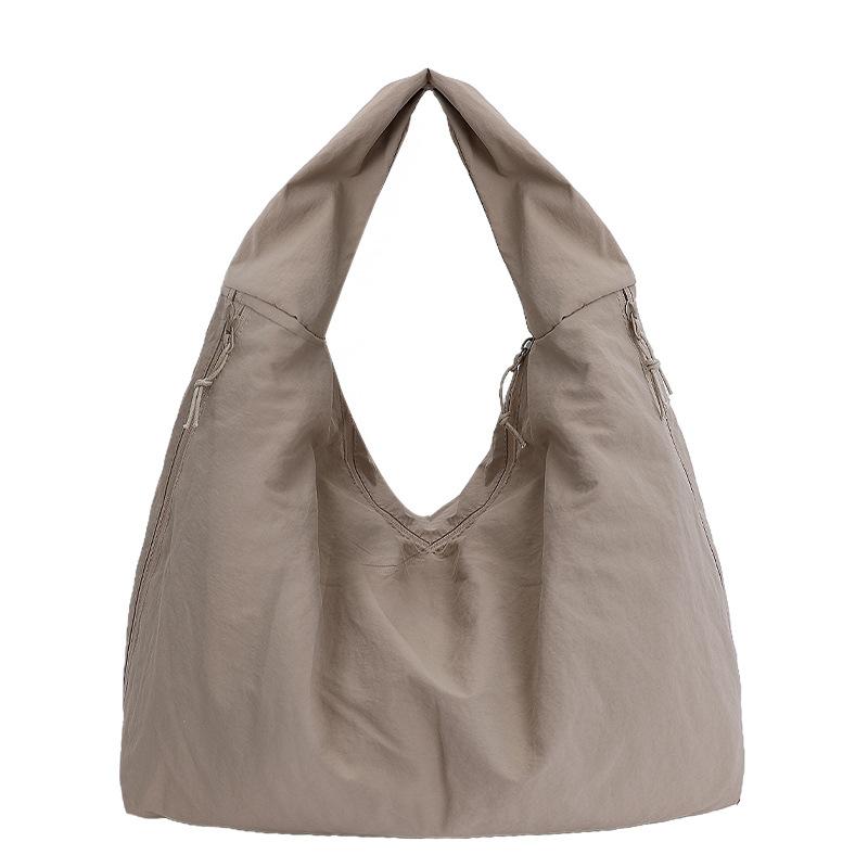 Autumn and winter versatile commuter shoulder bag women's large-capacity lazy style casual canvas tote bag new armpit bag
