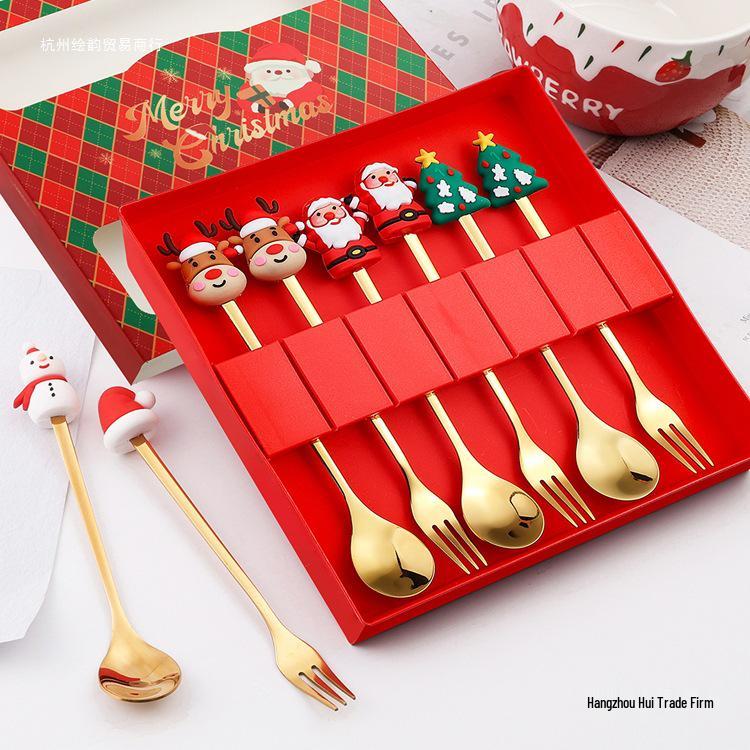 Christmas Cartoon Cutlery Set: Forks, Spoons, and Gift Box Featuring Cute Reindeer and Tree Designs.