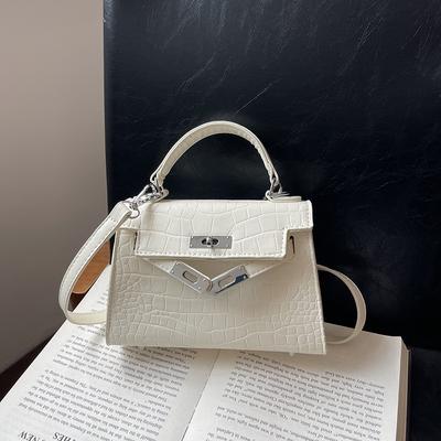 Nova moda clássica padrão de pedra pequena Kaibaoli portátil ombro transversal inclinado bolsa feminina da moda