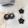 Retro Hong Kong style simple black and white polka dot flower earrings geometric oval temperament earrings fashionable personalized versatile earrings