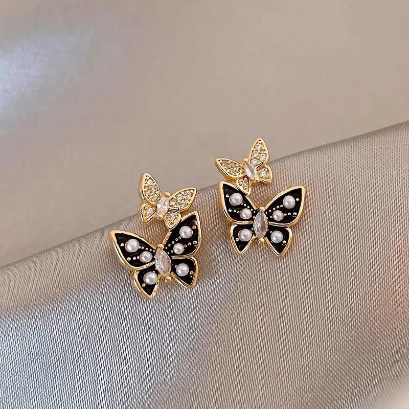 New trendy spring and summer butterfly pearl stud earrings temperament high-end unique earrings niche design earrings