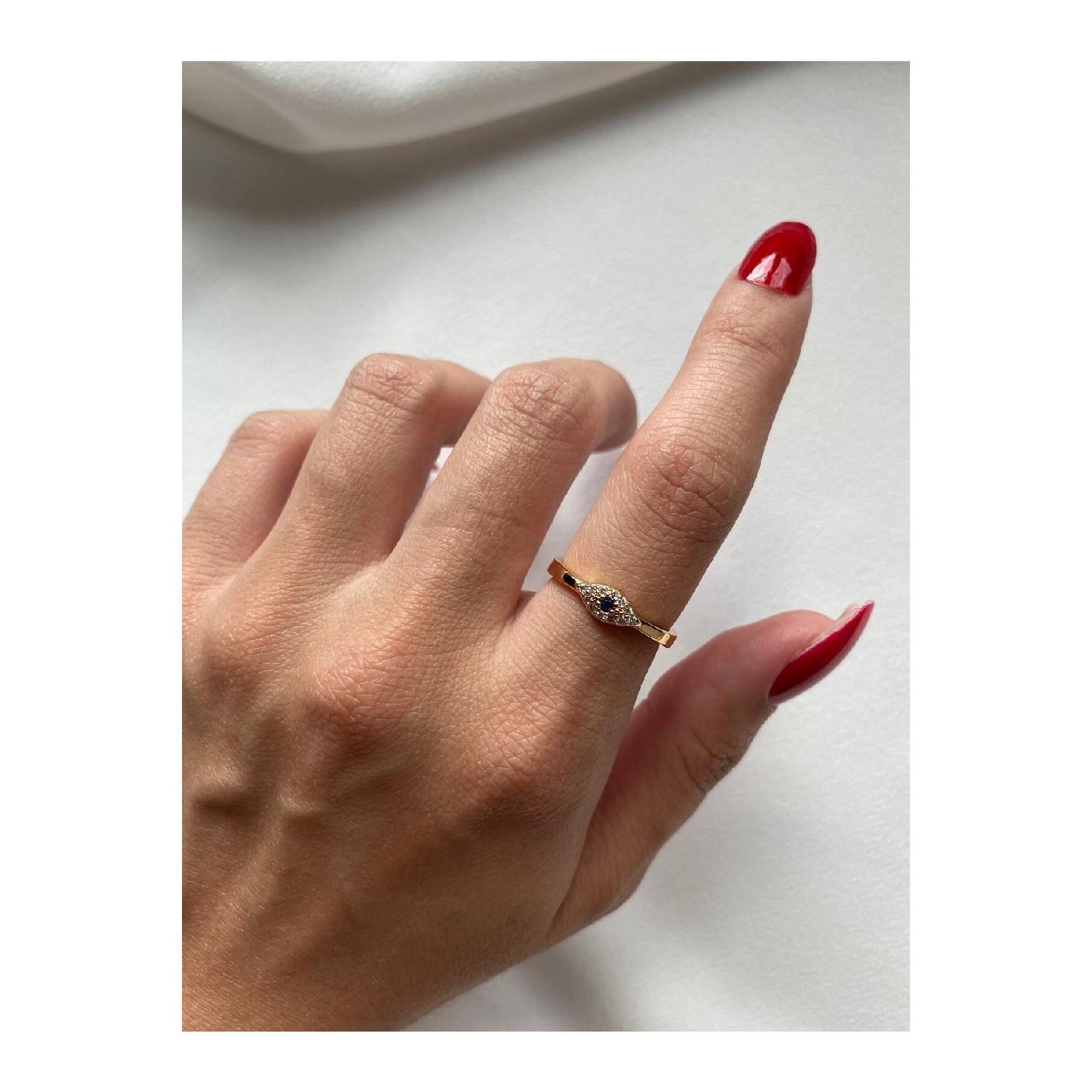 

Золотое кольцо с камнем и цирконом в форме глаза