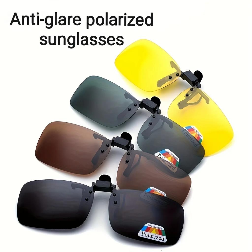 A pair of stylish four-piece flip-on polarized night vision sunglasses with an anti-glare mirror coating, ideal for driving.