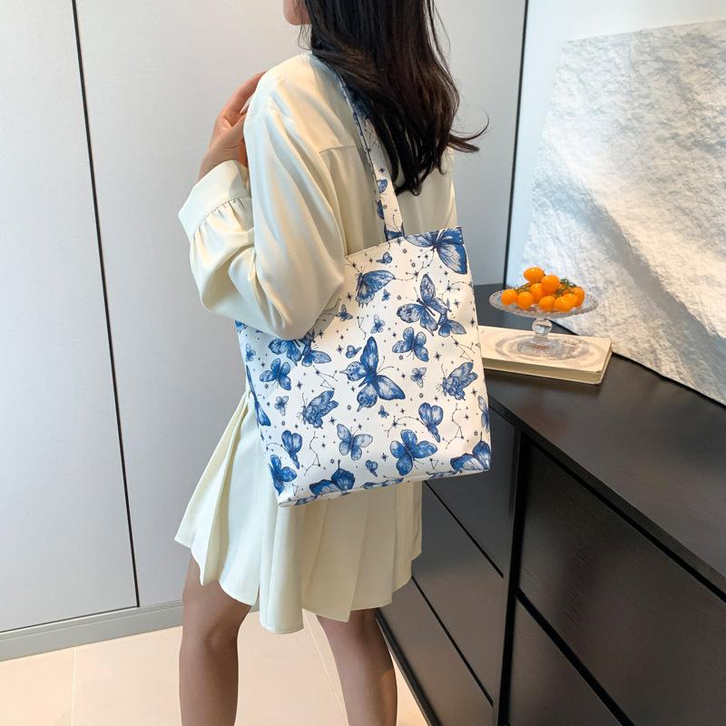 Large Capacity Tote Bag Women's New Summer Beautiful and Fashionable Simple Texture Contrasting Color Commuter Shoulder Bag