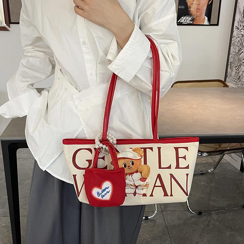 Large capacity bear letter tote bag women's new niche canvas bag versatile commuter tutoring bag