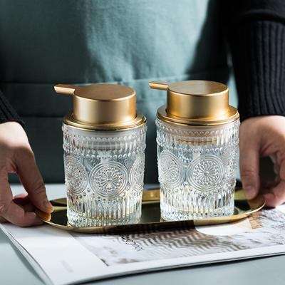 Zeepdispenser van reliëfglas met rustieke gouden pomp, handzeepdispenser, zeepdispenser, toiletzeepdispenser.