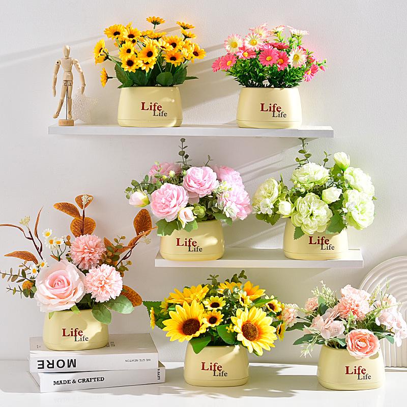 Living Room Decor: Artificial Sunflower and Green Plant Arrangements, Small Potted Plants, and Plastic Bouquets