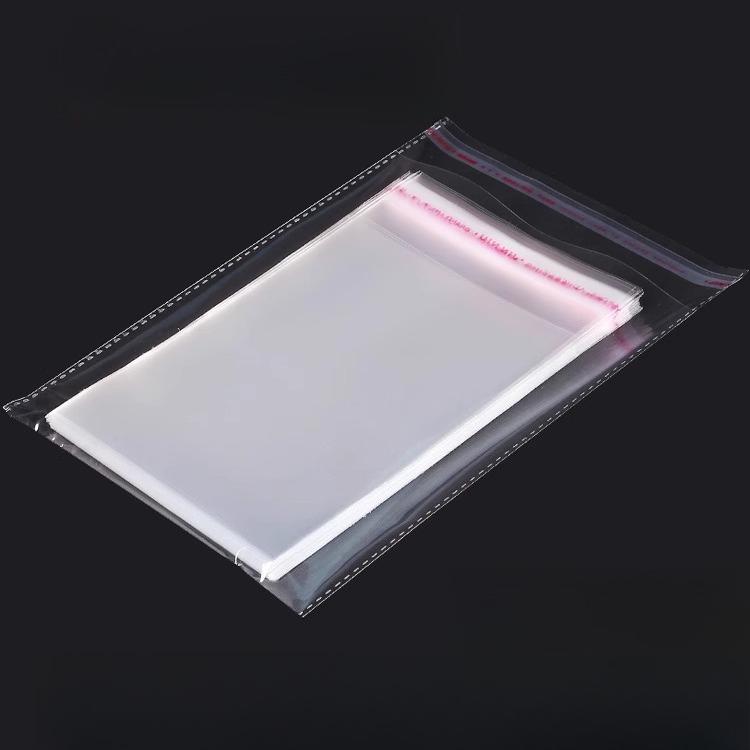 100 Stück Hochtransparenz OPP Dick 0,05 mm Selbstklebend Selbstversiegelnd Buch Kleidung Maske Plastik Siegel Verpackungsbeutel Feuchtigkeitsdichter Verpackungsbeutel