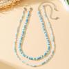 Versatile Sky Blue Bead Necklace: Small & Large Beads for a Fashionable European & American Resort Casual Look.