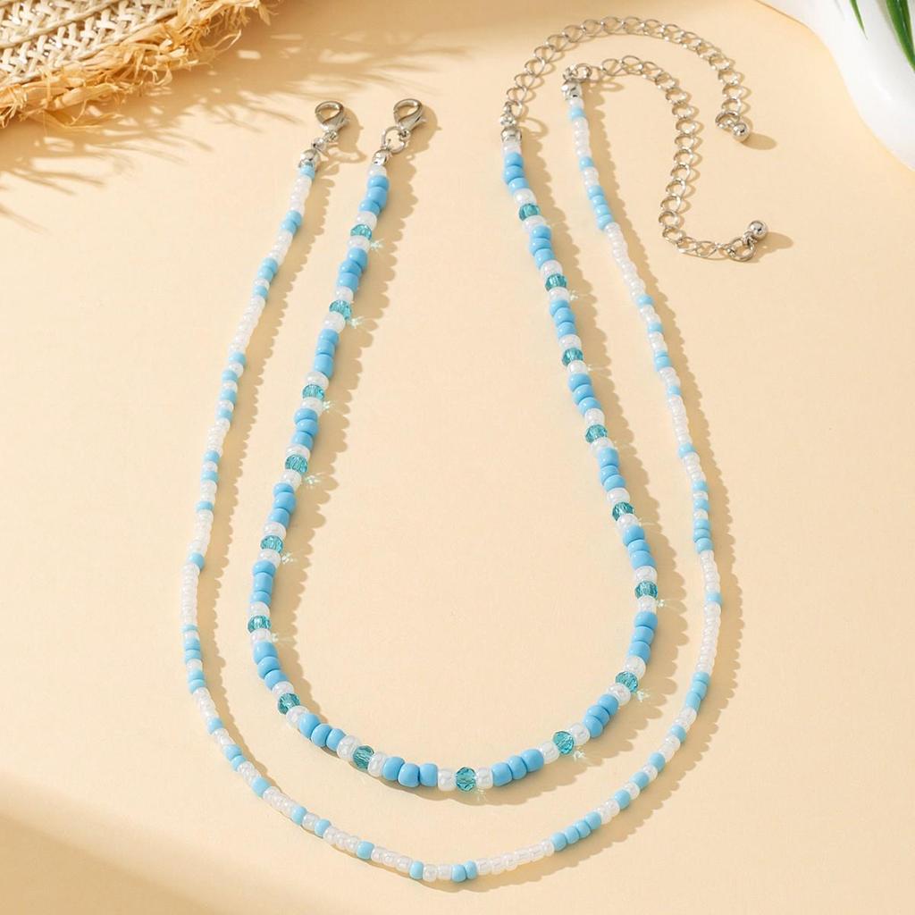 Versatile Sky Blue Bead Necklace: Small & Large Beads for a Fashionable European & American Resort Casual Look.