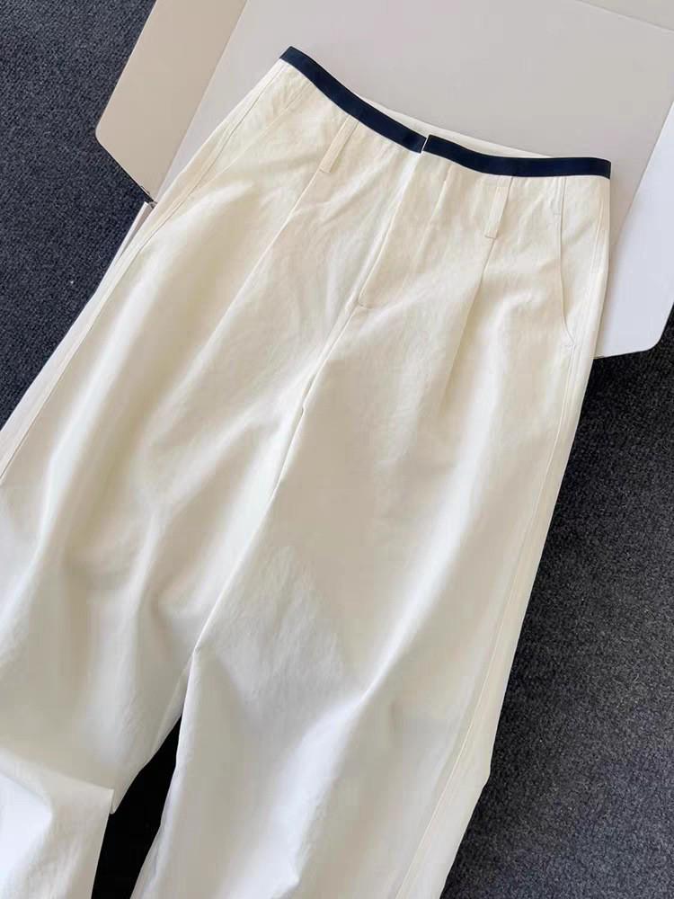 

CHAO-Level Casual Wide-Leg Pants for Women: Minimalist Style with Contrasting Waistband and Curved Leg Design Medium