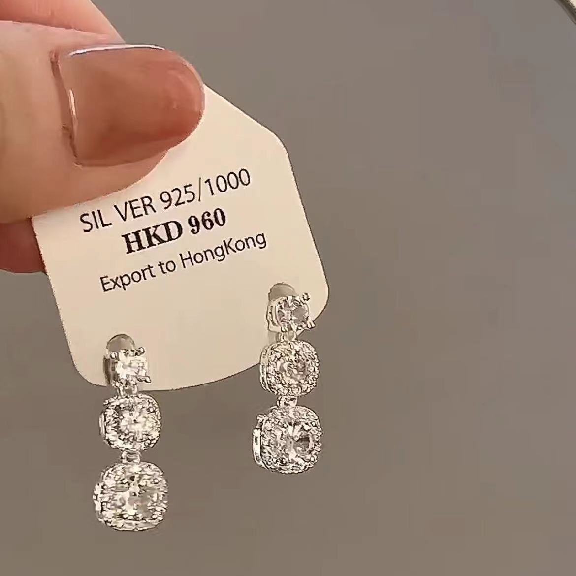 

French temperament zircon stud earrings female Hong Kong style banquet super flash light luxury micro-inlaid rhinestone earrings silver needles